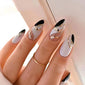 Black and white wavy nail art