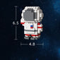 Astronauts assemble building block toys.