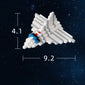 Astronauts assemble building block toys.
