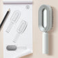 Self-cleaning anti-static hairbrush for women