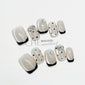 Cat-eye polka dot nail art