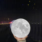 Moon-shaped night light