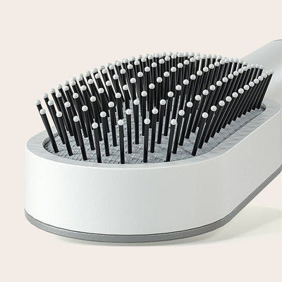 Self-cleaning anti-static hairbrush for women