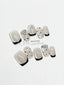 Cat-eye polka dot nail art